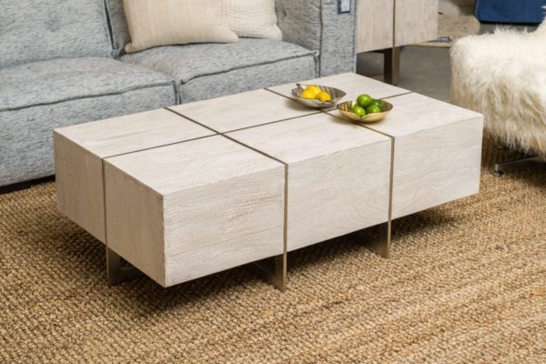white wash wood coffee table in living room setting