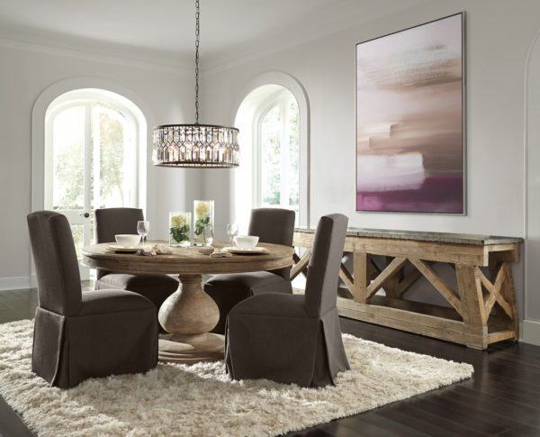 round pedestal dining table in dining room setting