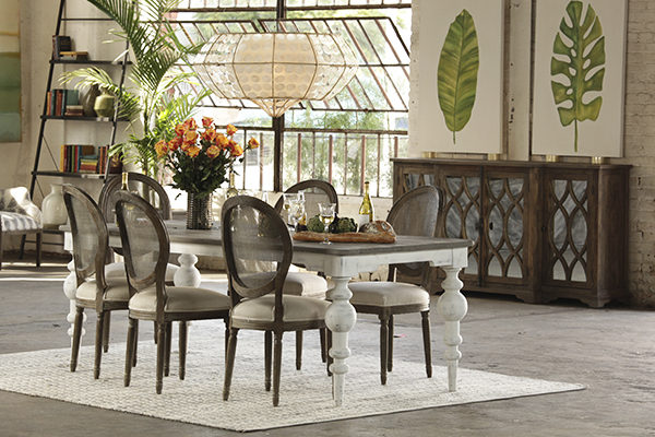 round back oak and linen dining chairs shown in open dining room setting
