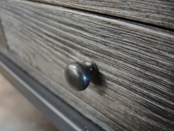 dark grey distressed desk close up