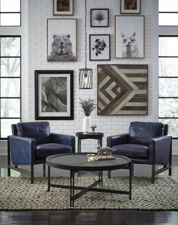 dark blue leather accent chairs on living room space