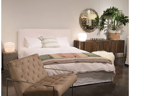 white slipcover bed in bedroom setting