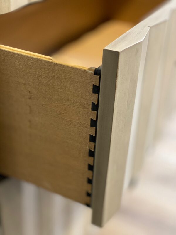 Grey wash tall wood dresser detail