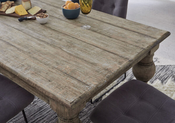 distressed wood dining table close up