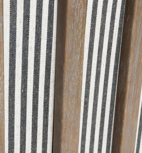 white and grey striped accent chair with wood legs close up