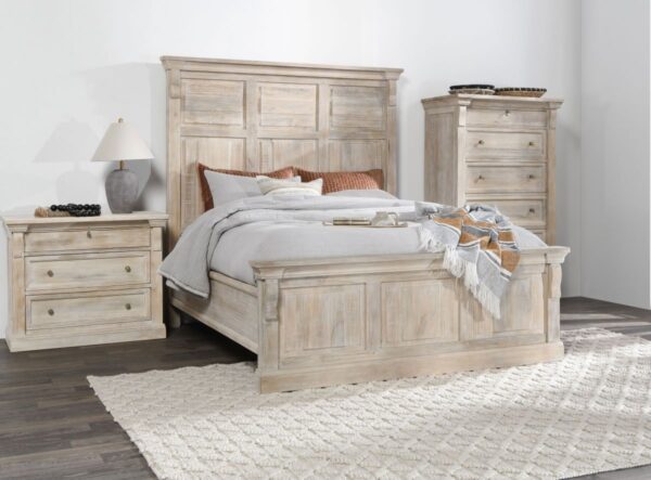 Wood bed in whitewash finish seen in bedroom