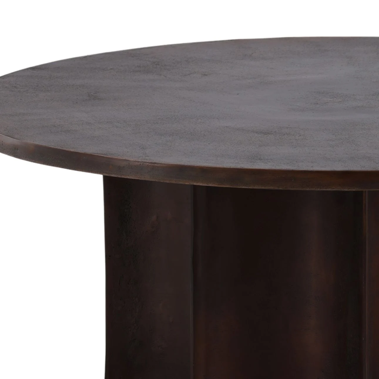 Round aluminum coffee table with sculptural base in antique bronze finish, designed for modern and transitional living rooms. Detail view