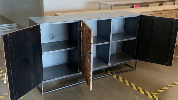 Medium size cabinet with reclaimed wood front and black steel body seen with open doors