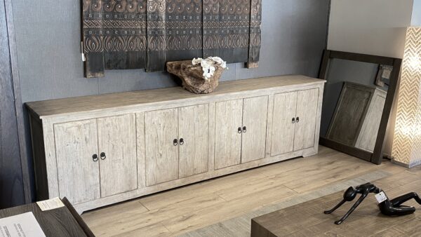 Long reclaimed wood sideboard TV console in natural color in showroom