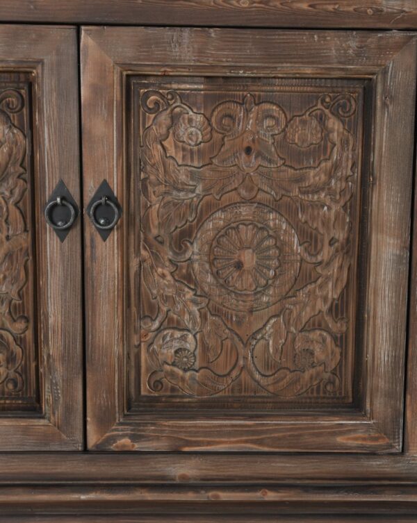carved wood sideboard close up