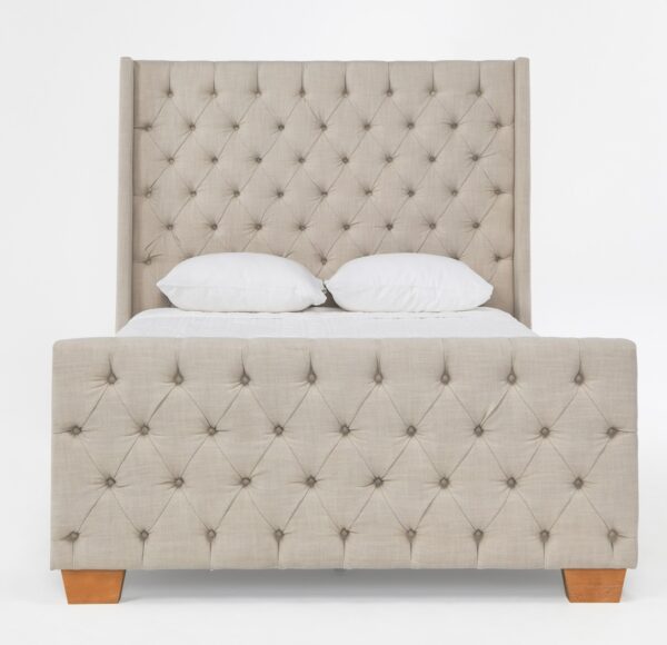 Light grey upholstered tufted queen size bed, front view