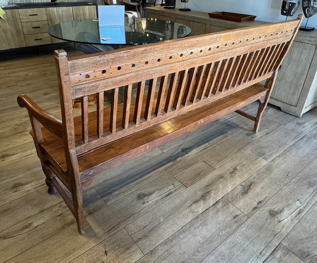 Antique Indonesian teak bench made from reclaimed solid wood with natural grain, warm patina, and handcrafted detailing. Back view