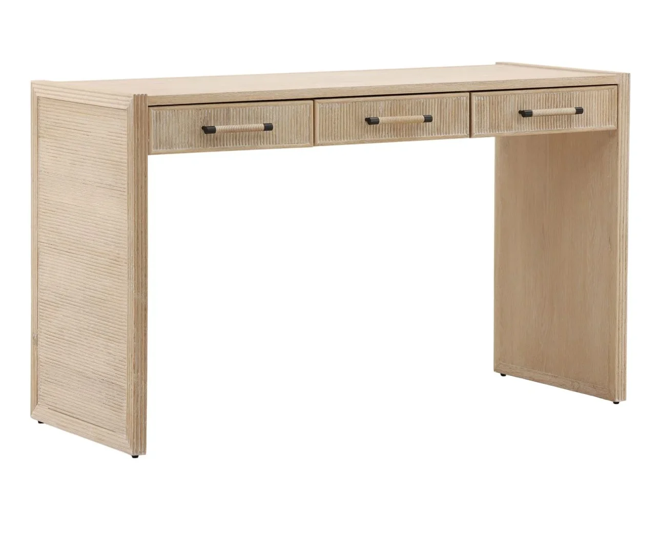 The Isla Desk is crafted from solid oak wood with a beautiful light natural finish. Featuring reeded details and three drawers, it's perfect for a home office or vanity, three quarter view