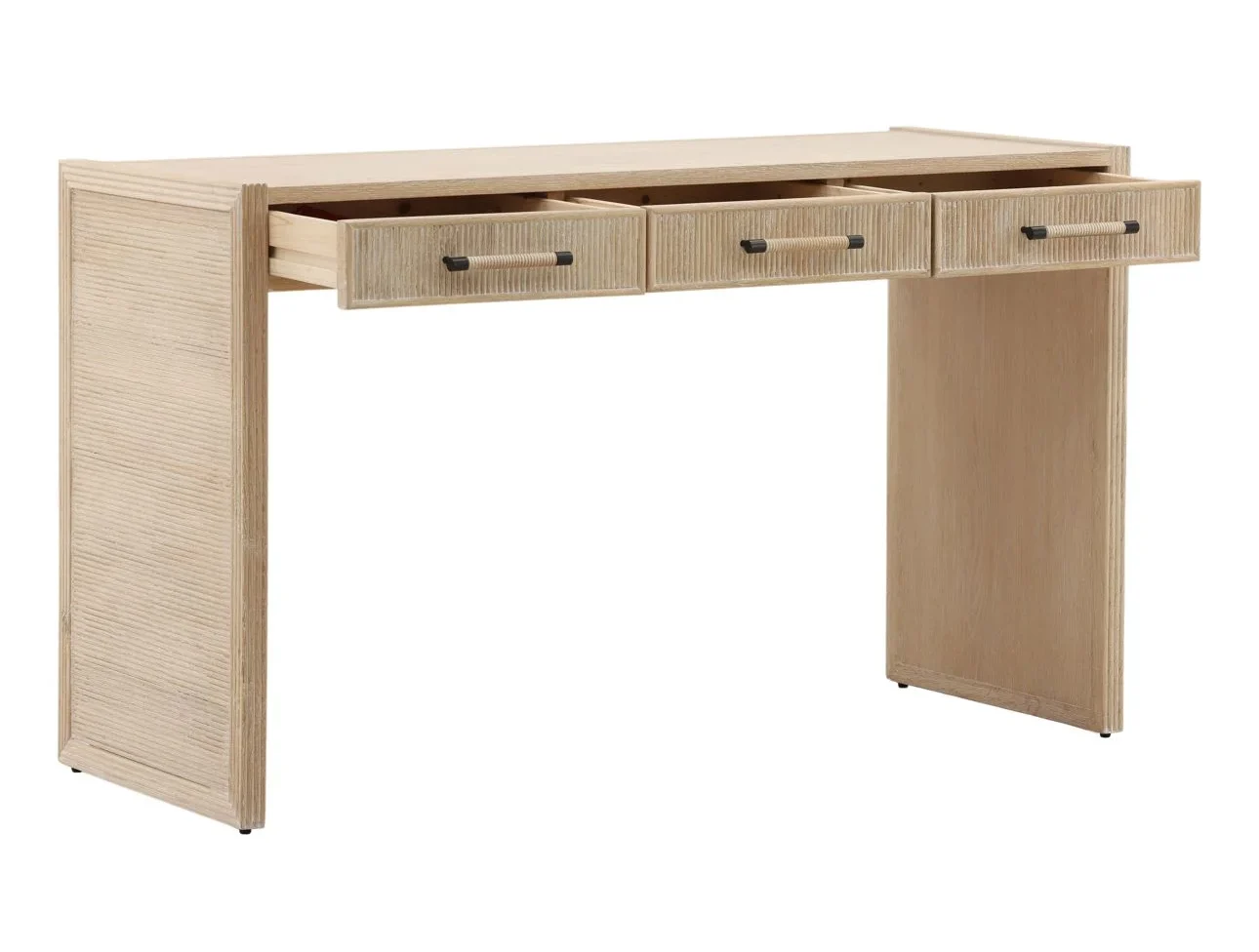The Isla Desk is crafted from solid oak wood with a beautiful light natural finish. Featuring reeded details and three drawers, it's perfect for a home office or vanity, open drawer