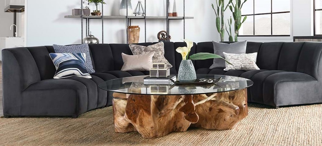 Charcoal grey sofa and root coffee table