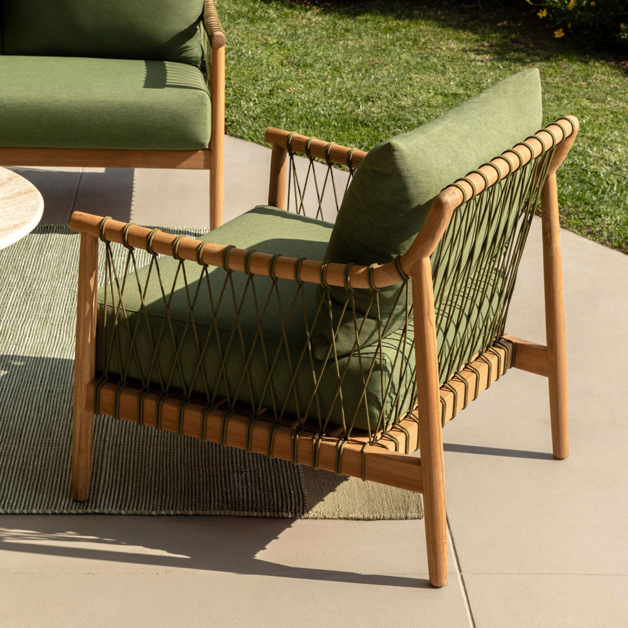 Solid teak club chair in natural wood finish with weather-resistant greencushions. Perfect for outdoor use, outdoor view 2