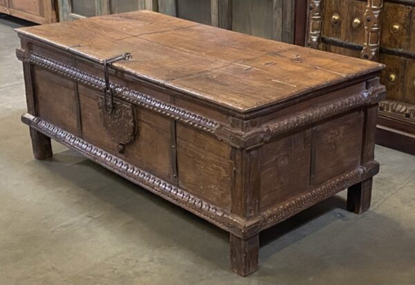 Brown vintage trunk with carved body