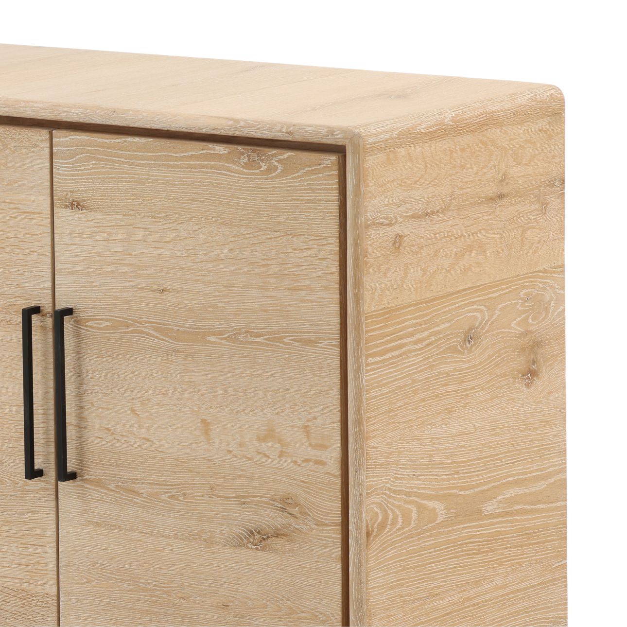 Four door light wood contemporary cabinet with metal handles and shelf inside, corner detail view
