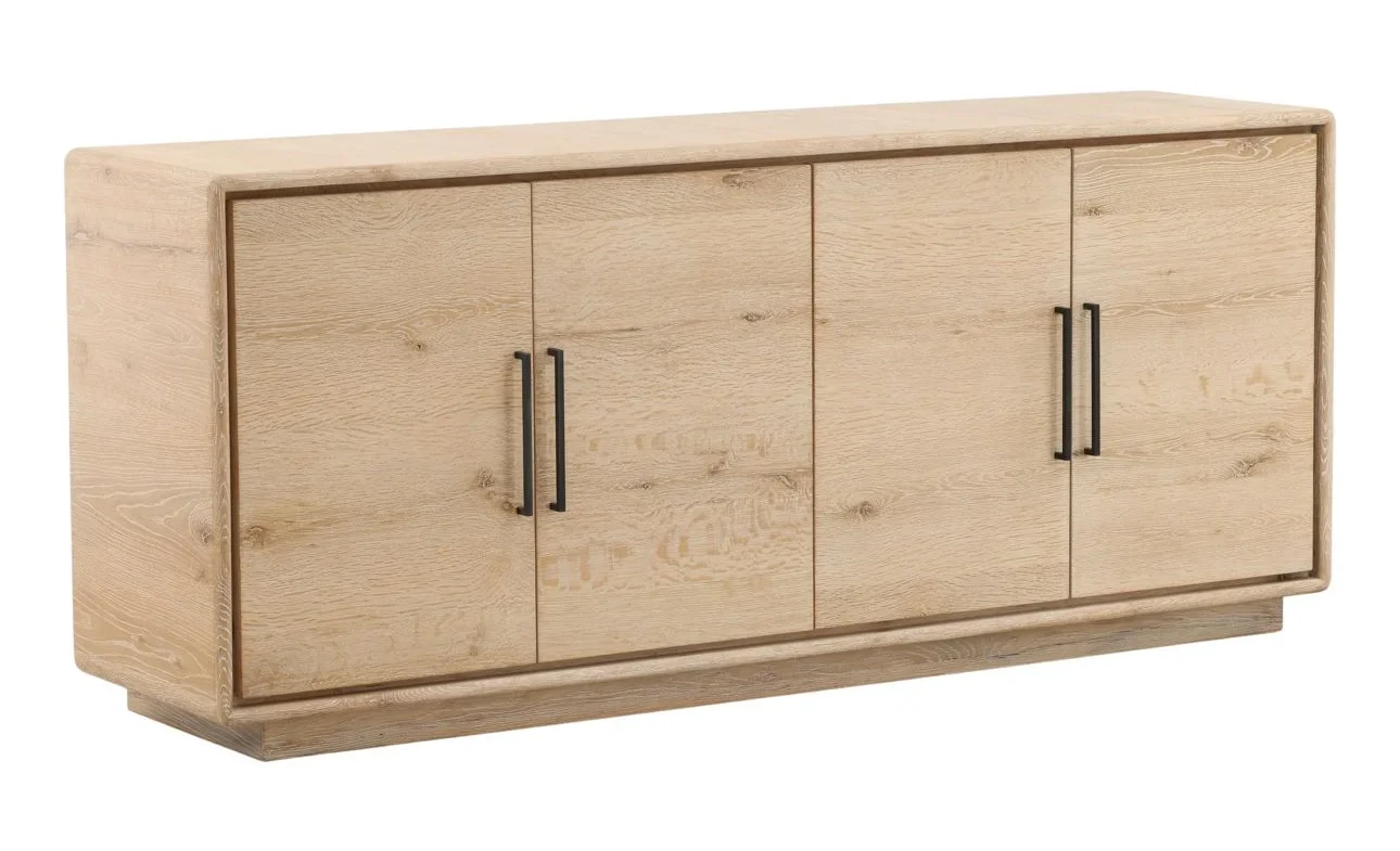 Four door light wood contemporary cabinet with metal handles and shelf inside, three quarters view