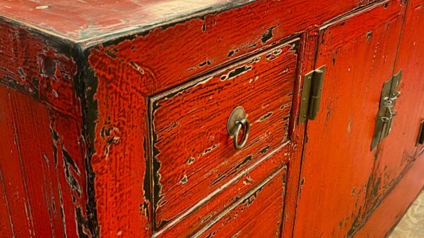 Rustic Chinese red cabinet paint detail