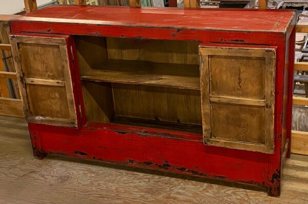 Vintage Chinese red cabinet shown with doors open