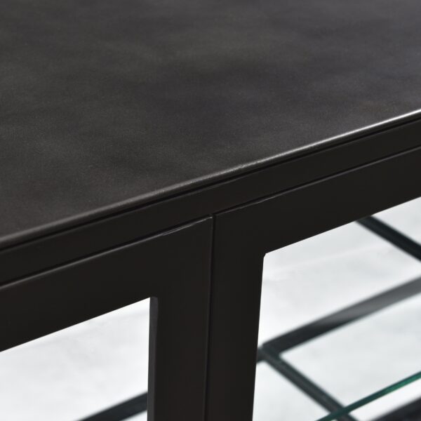 Black iron and glass sideboard, closeup.