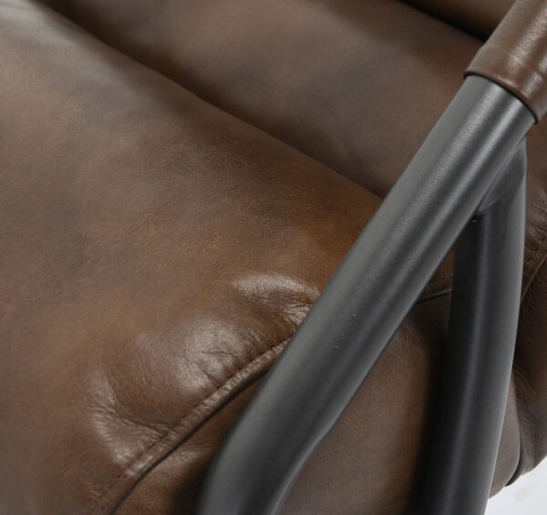 Brown leather chair with iron frame, detail