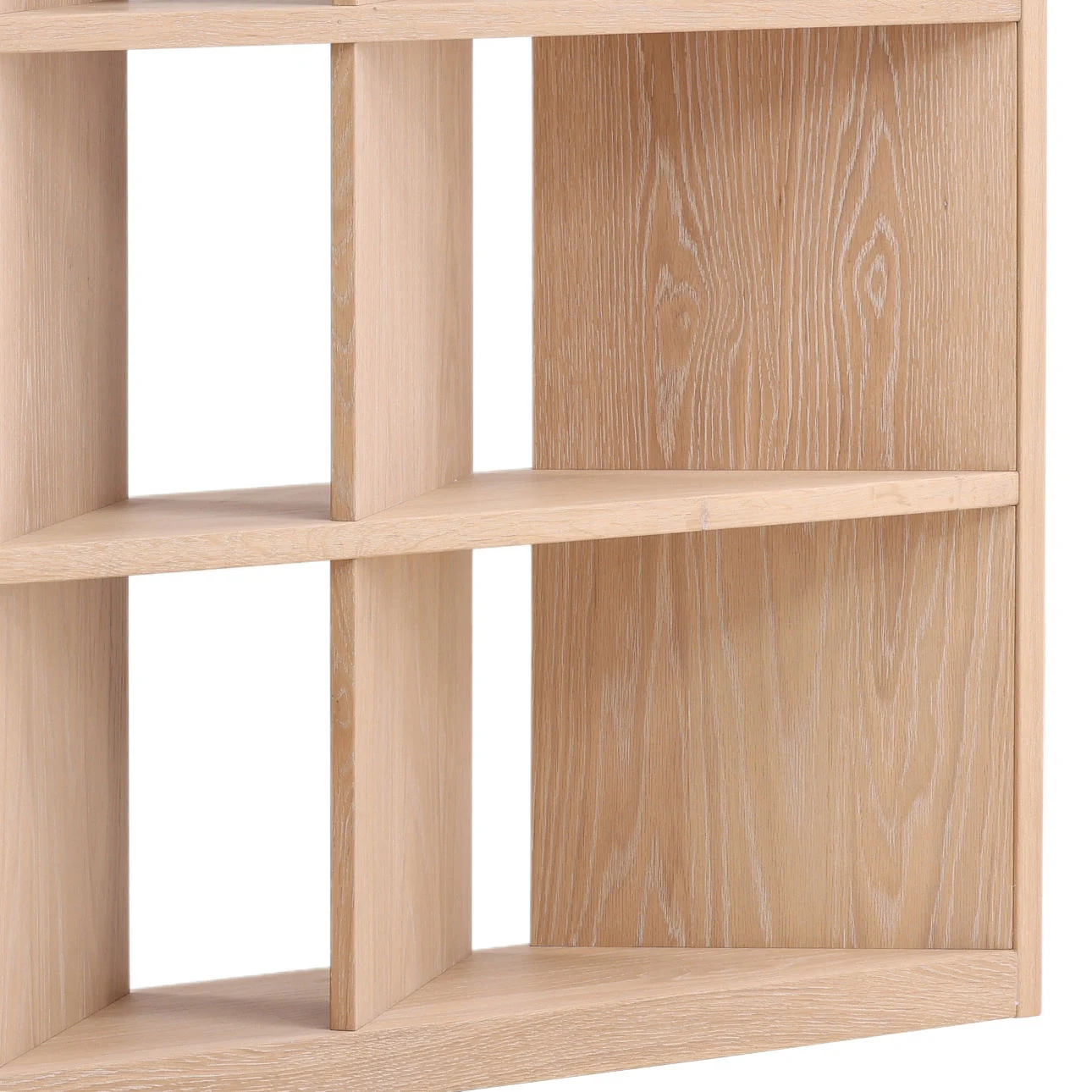 The Carpenter Bookcase is crafted from Oak wood and Oak Veneer, modern sophisticated bookcase with 5 shelves and 3 vertical running boards in diagonal as well as end board, corner detail