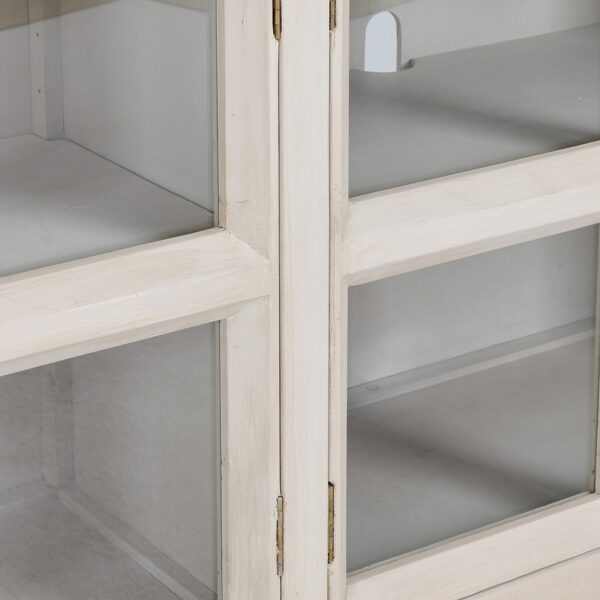 Long white media console with glass doors, detail