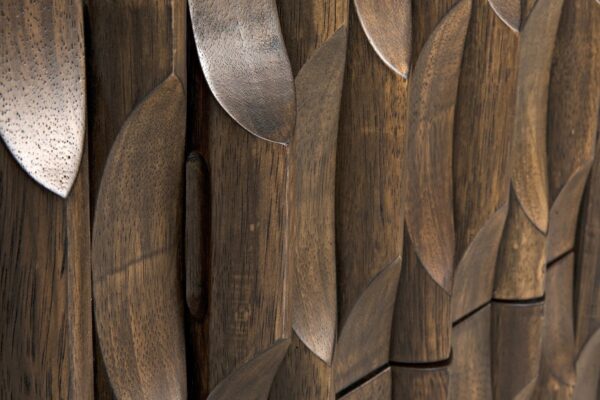 Carved dark walnut sideboard with drawers and cupboards, close up