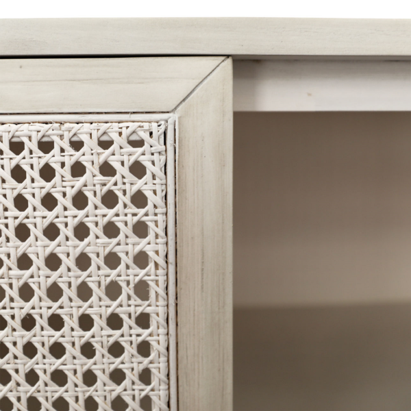 Long white media console with rattan doors, detail