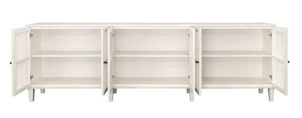 Long white media console with rattan doors, open