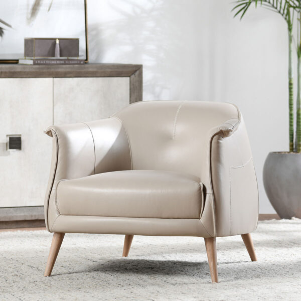 Ivory leather club chair, seen in living room