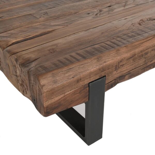 Rustic style coffee table with reclaimed wood top and iron base, leg detail