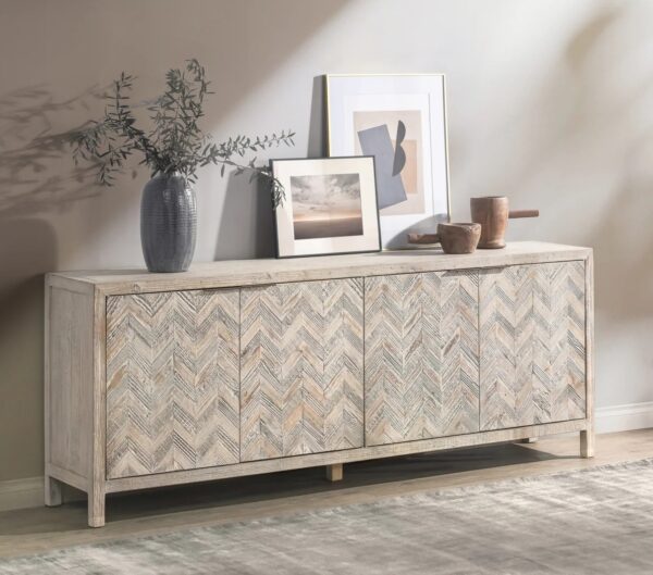 Pine wood media cabinet with herringbone design, shown in a room