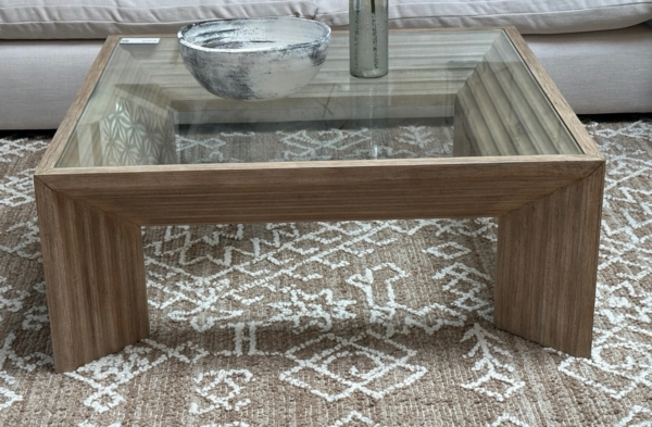 Square wood coffee table with glass top, side