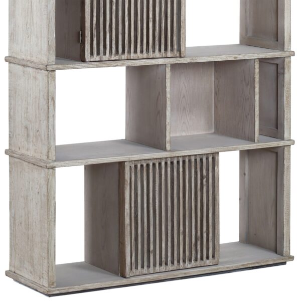 Tall, light grey bookcase with shelves and doors, detail