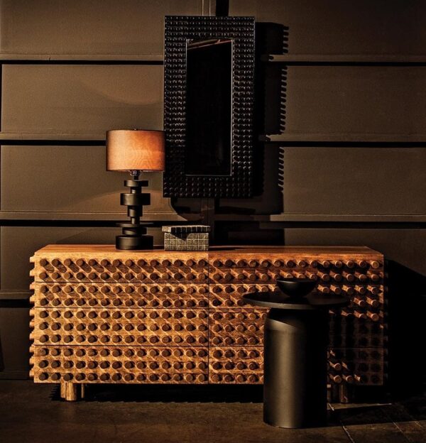 Large walnut color dresser with dowel button design, shown in home setting