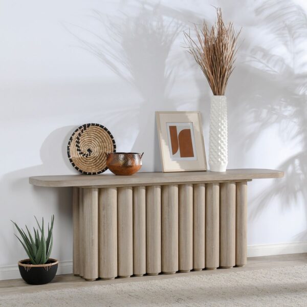 Long, reclaimed oak wood console table in whitewash finish, seen in home setting