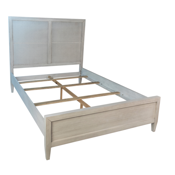 Solid wood bed with whitewash finish, side