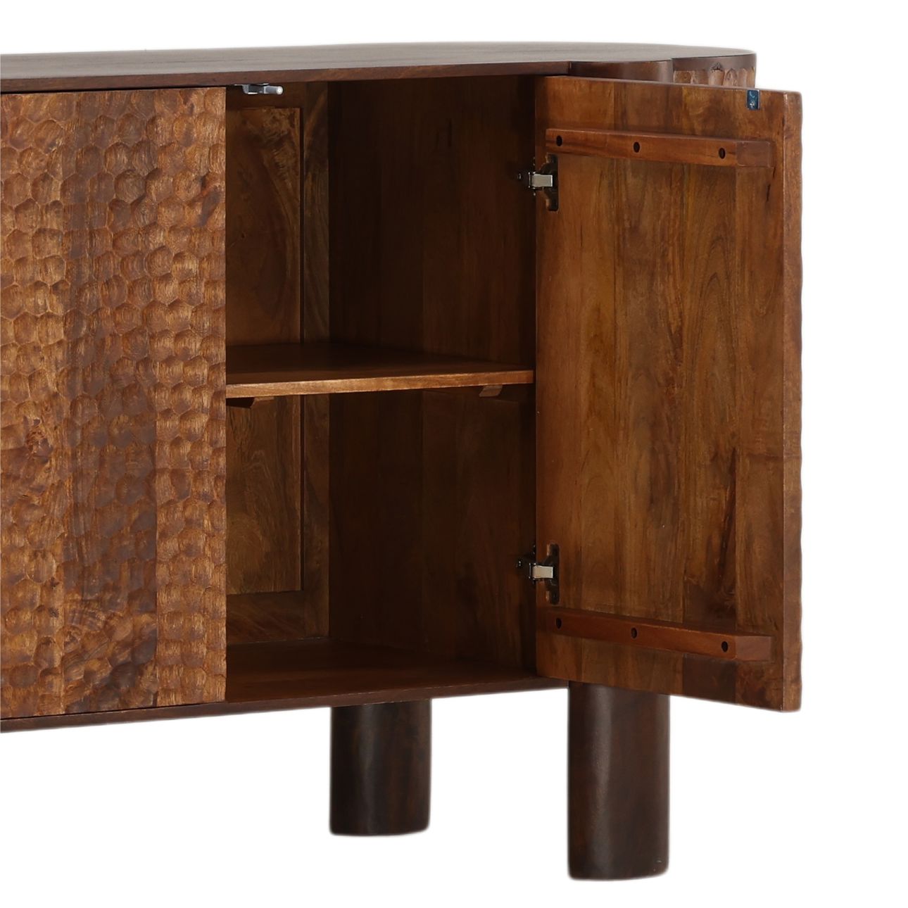 Three-door mango wood sideboard with carved geometric door detailing, natural wood finish, and concealed interior storage. Open door detail