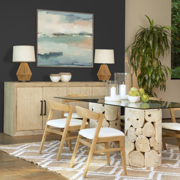 Light wood sideboard media console, shown in dining room setting