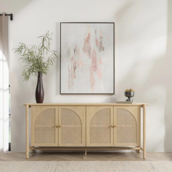 Light color oak and rattan media console with cathedral doors, shown in a room