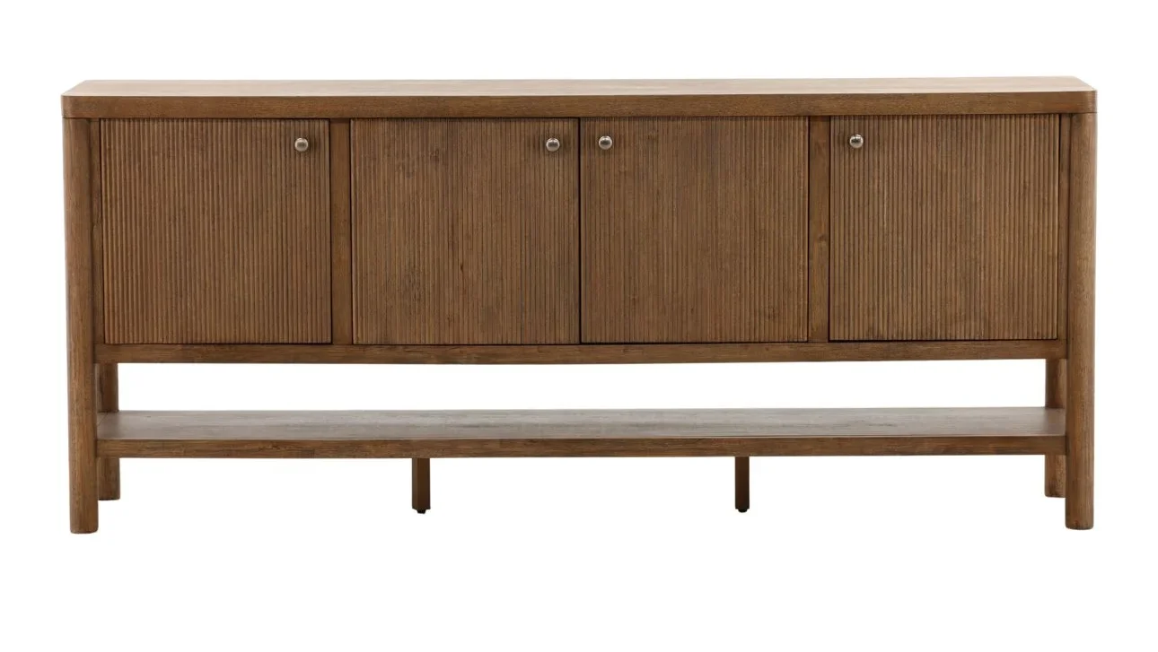 Dark brown rubber wood sideboard with reeded four-door front, round metal knobs, and an open lower shelf for storage or display, front view