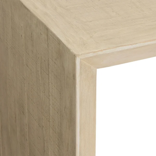 Large simple dining table with solid planks at the end of table in warm whitewash finish, detail corner