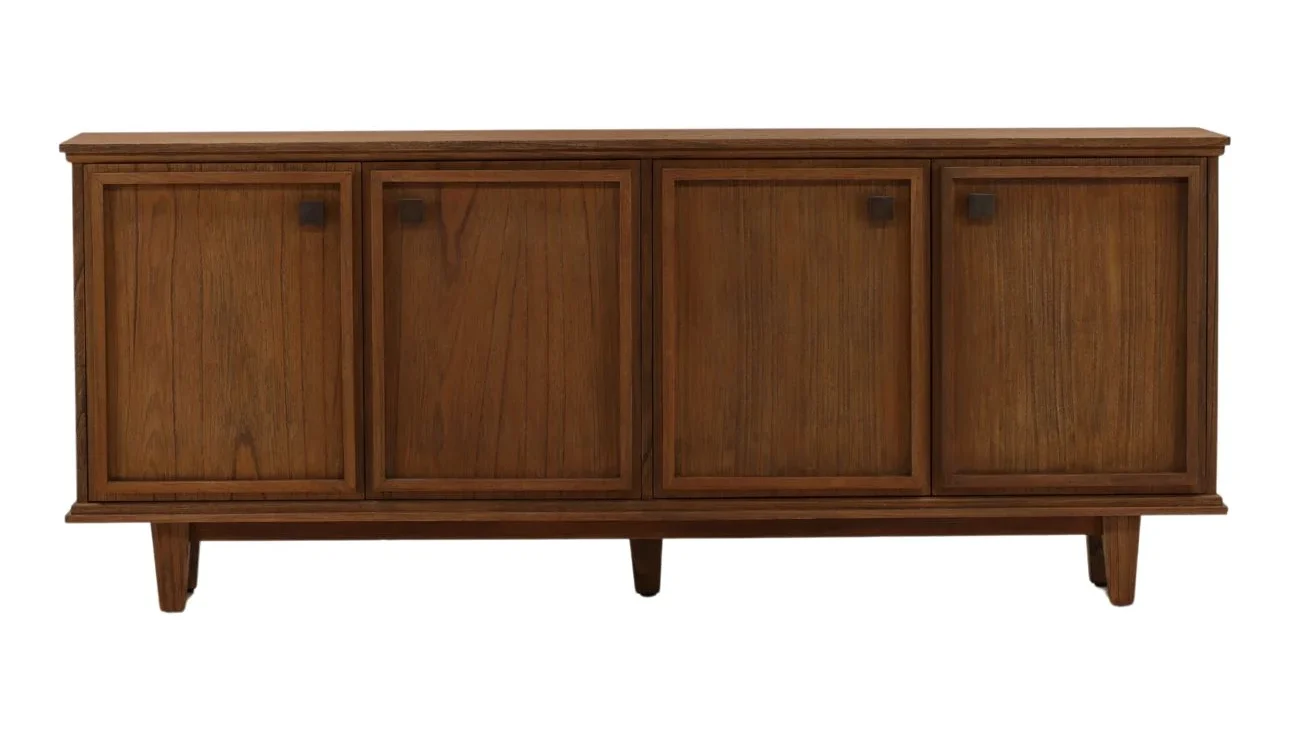 Four-door sideboard crafted from Mindi wood and veneer with a rich wood finish, clean lines, raised legs, and spacious concealed storage compartments. Front view