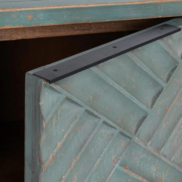 Teal color media cabinet with textured doors, interior shelves and cable holes, door detail